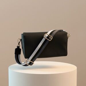 Sleek Small Black Crossbody Diaper Bag with Striped Strap